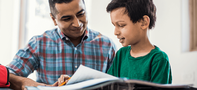 Student and dad doing homework