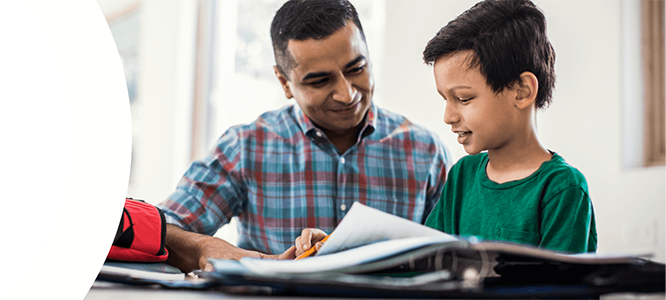 Student and dad doing homework